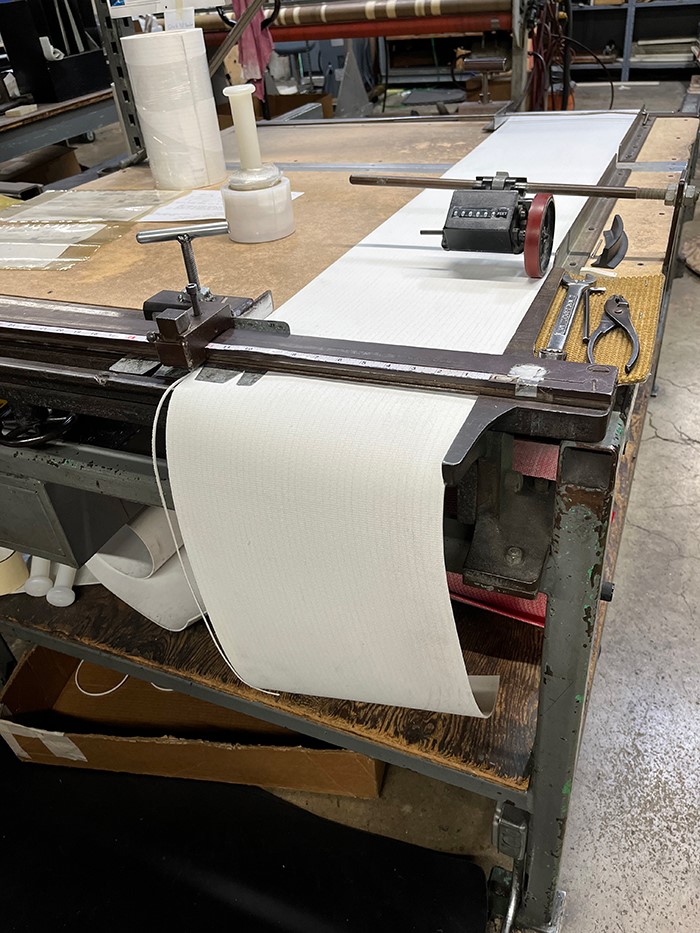 Our first Slitter--100 years old and still going! Millions of belts cut to size...